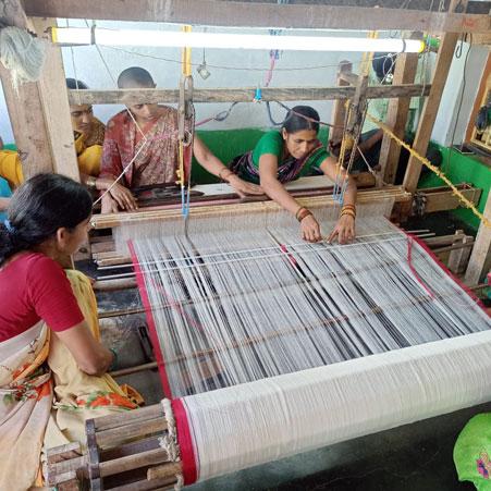Women weavers of Devarvalsa learning a new weaving technique called Ballakkami. The training was facilitated by the president of one of the largest weaver producer companies of Andhra Pradesh and Telangana.